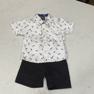 White with black shorts/shirt set. 24 mths
